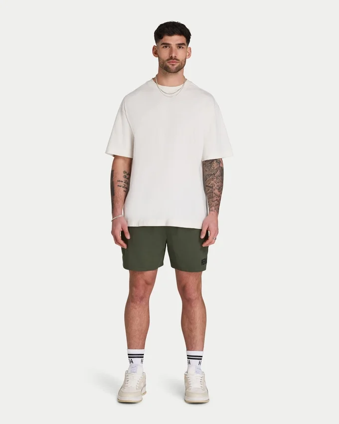 Pantalones cortos de hombre que cambian de color al contacto con el agua Pantalones cortos de hombre que cambian de color al contacto con el agua