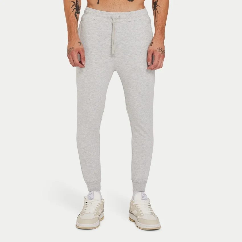 Pantalones de chándal ajustados Rewear Focus – gris jaspeado Pantalones de chándal ajustados Rewear Focus – gris jaspeado