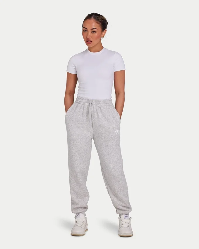 Pantalones de chándal colectivos para mujer – gris jaspeado Pantalones de chándal colectivos para mujer – gris jaspeado