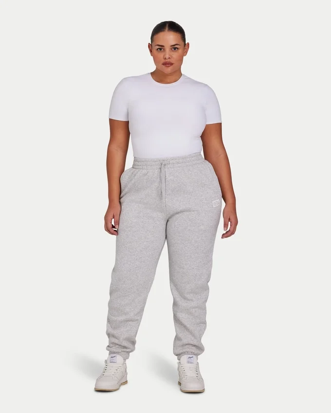 Pantalones de chándal colectivos para mujer – gris jaspeado Pantalones de chándal colectivos para mujer – gris jaspeado