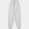 Pantalones de chándal colectivos para mujer – gris jaspeado Pantalones de chándal colectivos para mujer – gris jaspeado