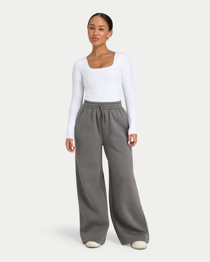 Pantalones de chándal de mujer de corte ancho «Collective» – gris carbón Pantalones de chándal de mujer de corte ancho «Collective» – gris carbón