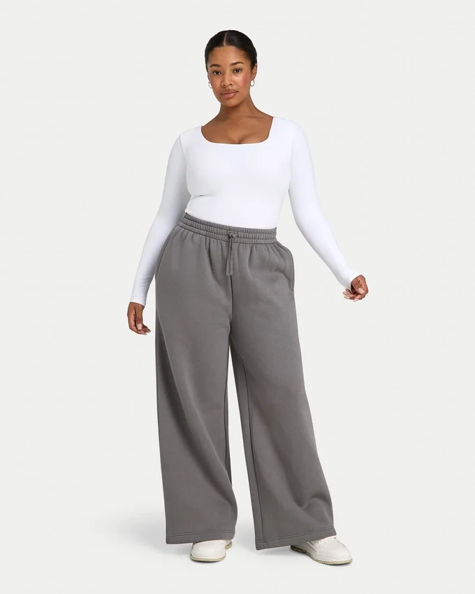 Pantalones de chándal de mujer de corte ancho «Collective» – gris carbón Pantalones de chándal de mujer de corte ancho «Collective» – gris carbón
