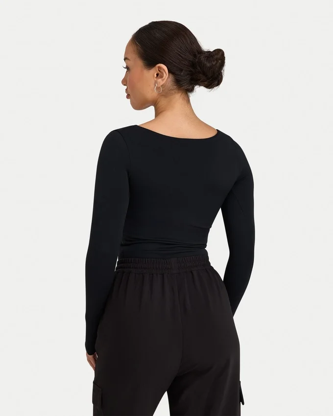 Partes de arriba de manga larga «Dual Wear» de la colección Essentials para mujer – negro Partes de arriba de manga larga «Dual Wear» de la colección Essentials para mujer – negro