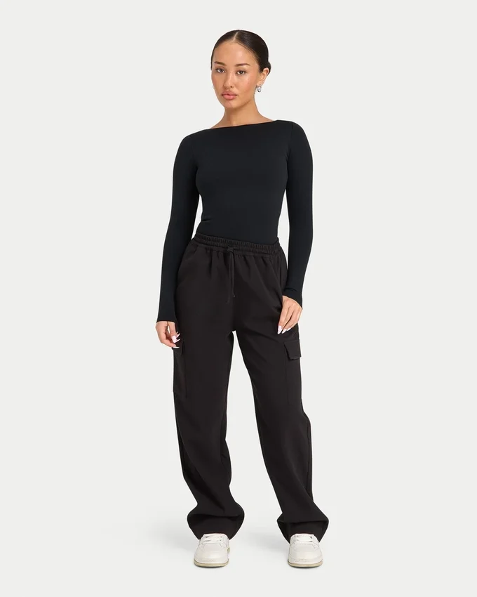 Partes de arriba de manga larga «Dual Wear» de la colección Essentials para mujer – negro Partes de arriba de manga larga «Dual Wear» de la colección Essentials para mujer – negro