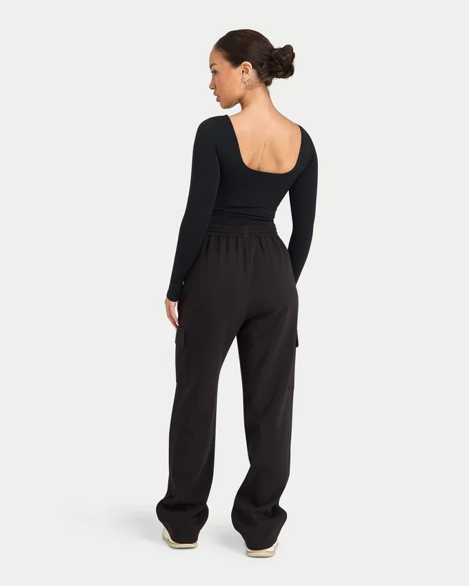 Partes de arriba de manga larga «Dual Wear» de la colección Essentials para mujer – negro Partes de arriba de manga larga «Dual Wear» de la colección Essentials para mujer – negro