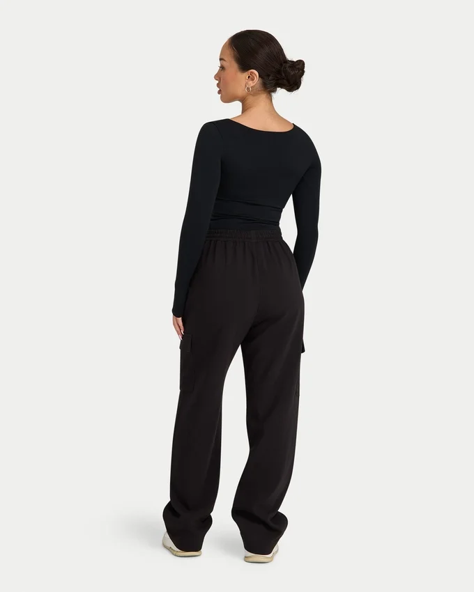 Partes de arriba de manga larga «Dual Wear» de la colección Essentials para mujer – negro Partes de arriba de manga larga «Dual Wear» de la colección Essentials para mujer – negro