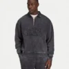 Sudadera Signature oversize con cremallera de 1/4 para hombre, con efecto lavado característico