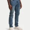 Vaqueros de corte holgado de Denim para hombre – lavado medio Vaqueros de corte holgado de Denim para hombre – lavado medio