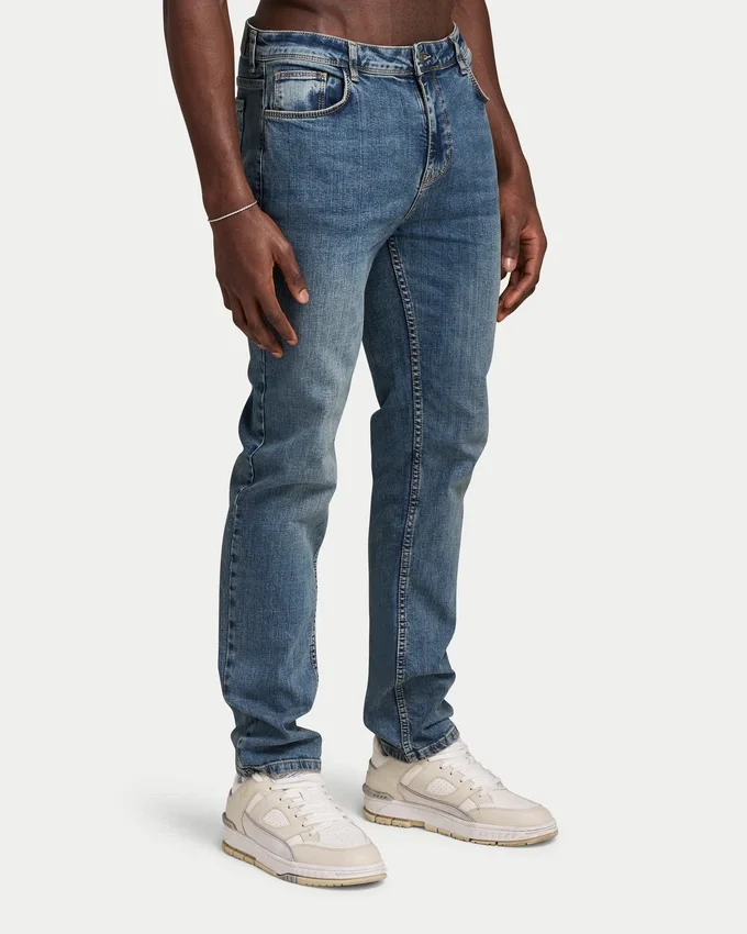 Vaqueros de corte holgado de Denim para hombre – lavado medio Vaqueros de corte holgado de Denim para hombre – lavado medio