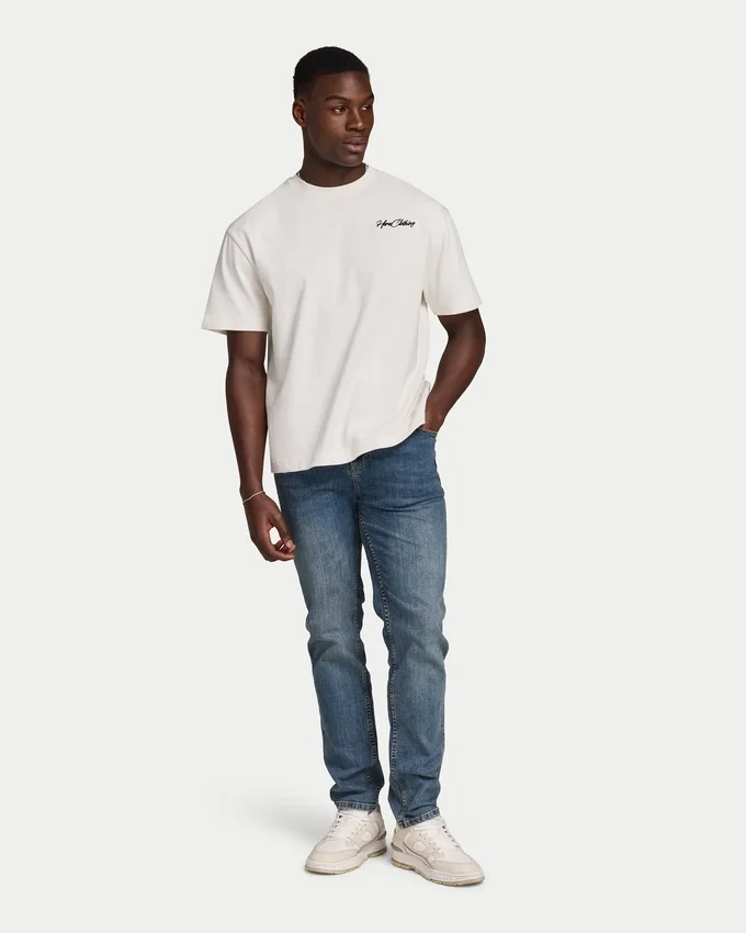Vaqueros de corte holgado de Denim para hombre – lavado medio Vaqueros de corte holgado de Denim para hombre – lavado medio